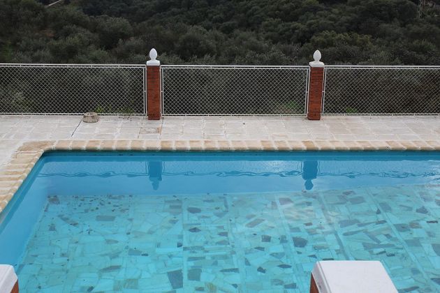 Foto 2 de Casa en venta en Almodóvar del Río de 6 habitaciones con terraza y piscina
