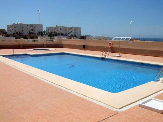 Foto 2 de Venta de piso en San Juan de los Terreros de 2 habitaciones con terraza y piscina