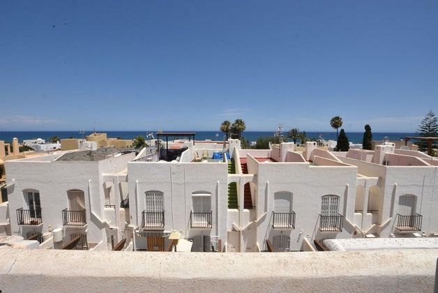 Foto 1 de Casa adosada en venta en Urb. El Palmeral de 3 habitaciones con terraza y piscina