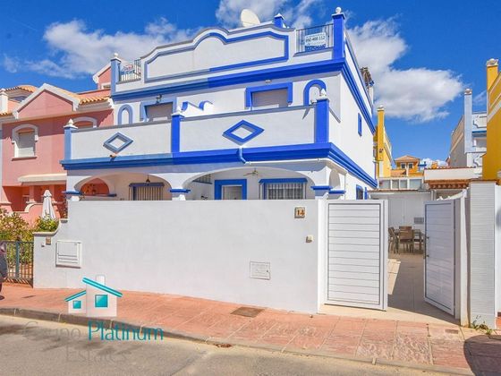 Foto 2 de Venta de casa adosada en San Juan de los Terreros de 3 habitaciones con terraza y piscina