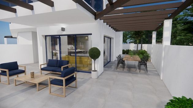 Foto 2 de Casa adosada en venta en Urb. El Palmeral de 3 habitaciones con terraza y piscina