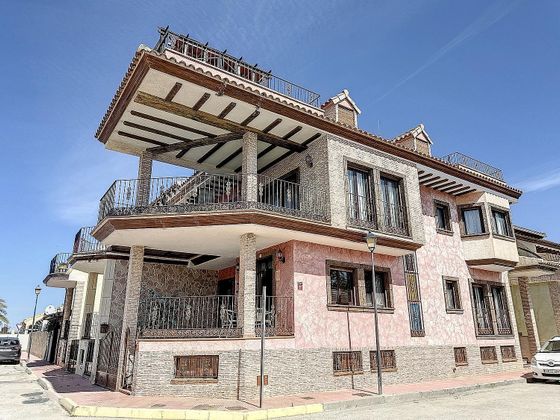 Foto 1 de Casa en venda a Daya Nueva de 7 habitacions amb terrassa i balcó