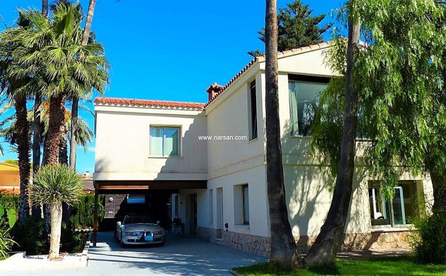 Foto 1 de Chalet en venta en El Grao de 4 habitaciones con piscina y garaje