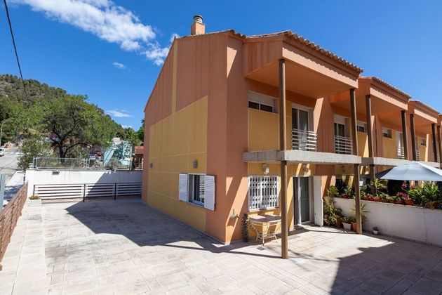 Foto 2 de Venta de casa adosada en Olocau de 3 habitaciones con terraza y piscina