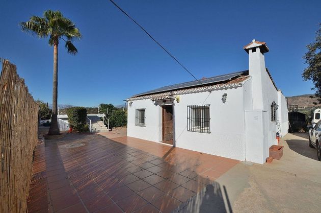 Foto 1 de Casa en venta en Alhaurín el Grande de 4 habitaciones con terraza y piscina