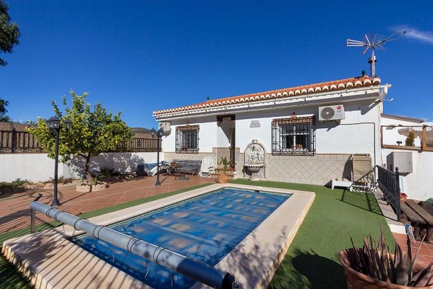 Foto 1 de Venta de chalet en Albuñuelas de 3 habitaciones con terraza y piscina