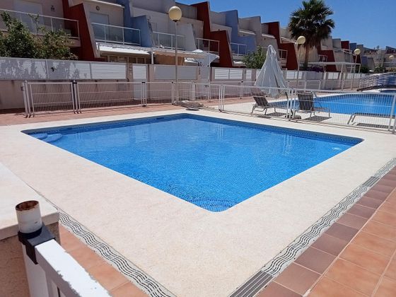 Foto 1 de Casa adossada en venda a El Balcó - Jaume I de 2 habitacions amb terrassa i piscina