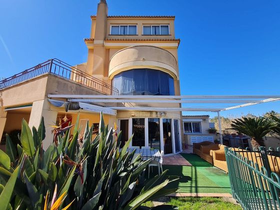 Foto 1 de Casa adossada en venda a Grau de Gandia- Marenys Rafalcaid de 4 habitacions amb terrassa i piscina