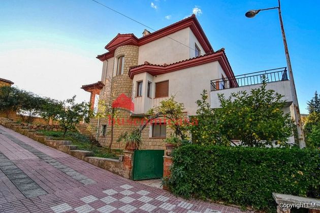 Foto 2 de Chalet en venta en Linares de 4 habitaciones con terraza y garaje