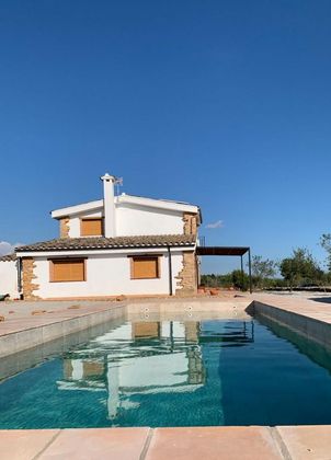 Foto 1 de Venta de casa rural en Coves de Vinromà (les) de 4 habitaciones con piscina y calefacción