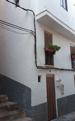 Foto 1 de Venta de casa en calle Atzeneta de 3 habitaciones con terraza y balcón