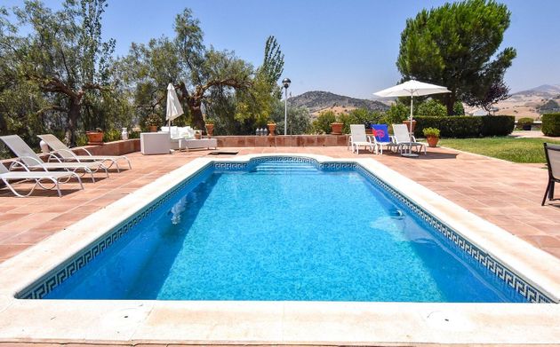 Foto 1 de Chalet en venta en Almogía de 5 habitaciones con terraza y piscina