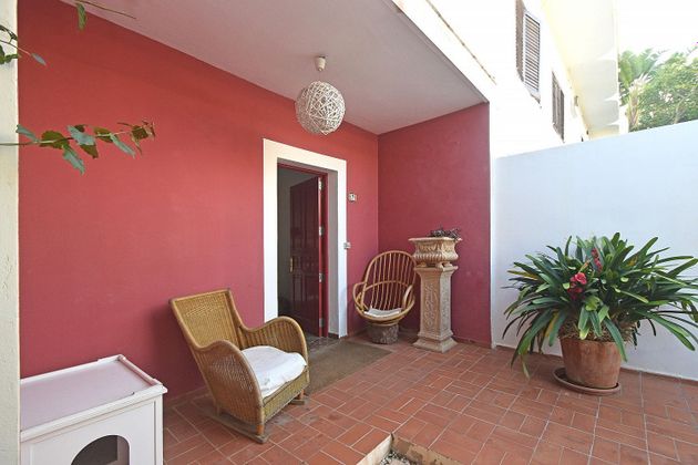 Foto 1 de Casa adossada en venda a Santa Eulalia del Río de 4 habitacions amb garatge i jardí