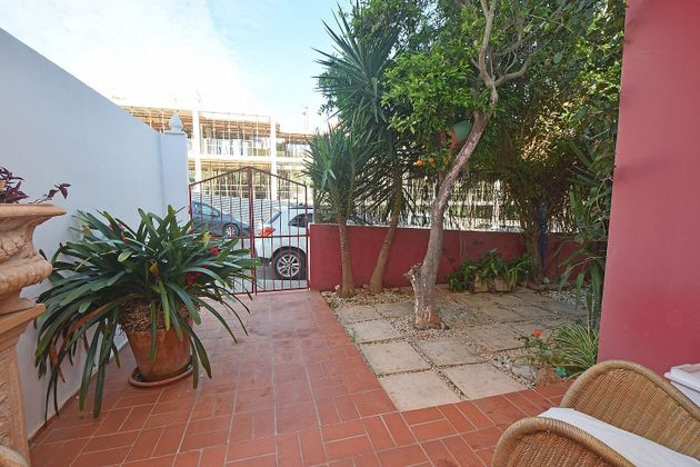 Foto 2 de Casa adossada en venda a Santa Eulalia del Río de 4 habitacions amb garatge i jardí