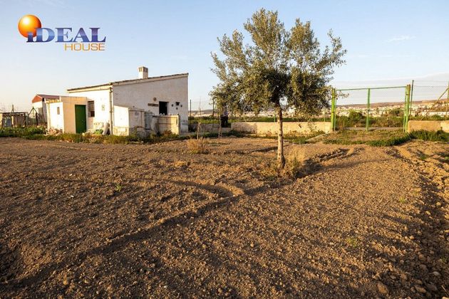 Foto 1 de Venta de terreno en Zubia (La) de 1475 m²