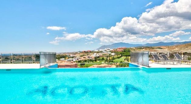 Foto 1 de Pis en venda a urbanización Los Flamingos de 2 habitacions amb terrassa i piscina