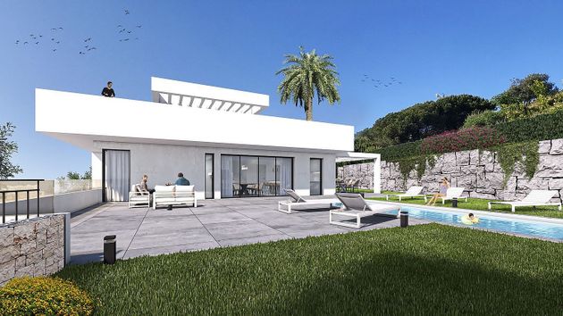Foto 1 de Xalet en venda a Riviera del Sol de 6 habitacions amb terrassa i piscina