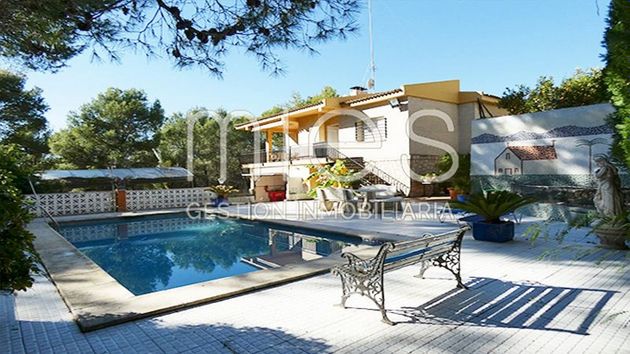 Foto 2 de Casa en venta en calle Agustina de Aragón de 4 habitaciones con terraza y piscina