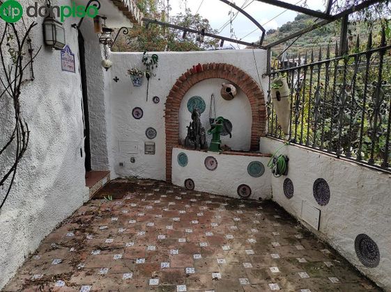Foto 1 de Casa rural en venda a calle San Miguel de 1 habitació amb jardí i calefacció