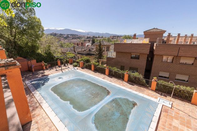 Foto 1 de Piso en venta en calle Escoriaza de 1 habitación con terraza y piscina