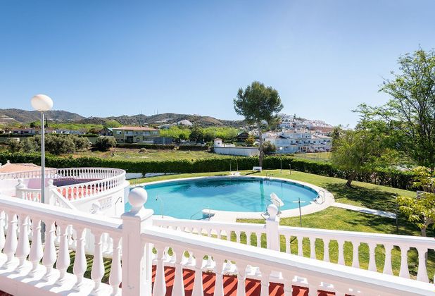 Foto 1 de Venta de casa en avenida Ciudad de Melilla de 4 habitaciones con terraza y piscina