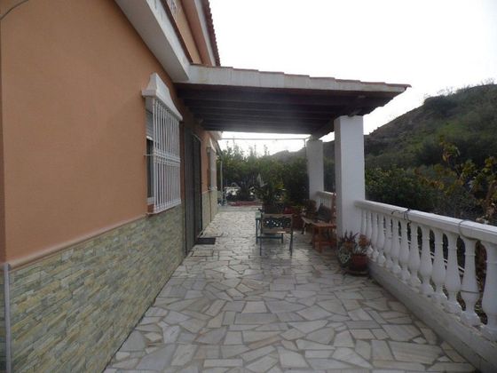 Foto 1 de Venta de casa rural en Viñuela de 5 habitaciones con terraza y piscina
