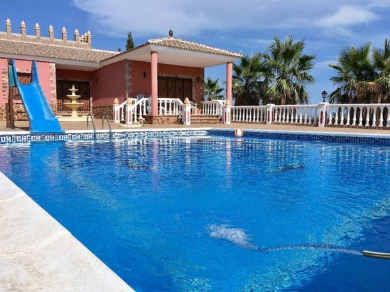 Foto 1 de Casa rural en venda a Sedella de 4 habitacions amb terrassa i piscina