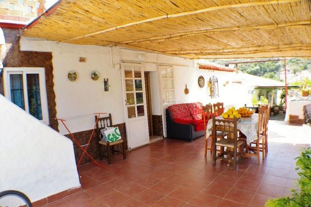 Foto 1 de Casa rural en venda a Viñuela de 3 habitacions amb terrassa i jardí
