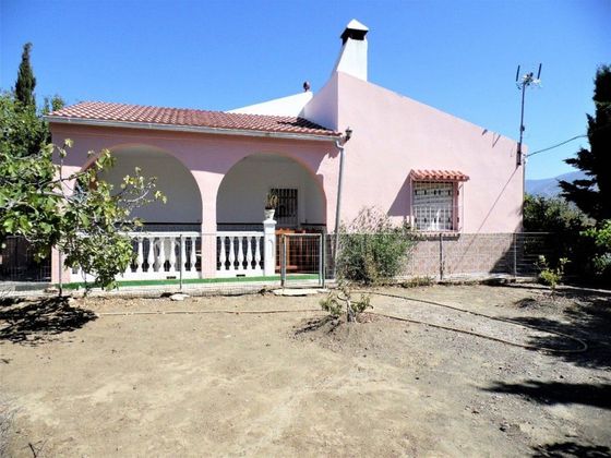Foto 1 de Venta de casa rural en Viñuela de 2 habitaciones con terraza y jardín