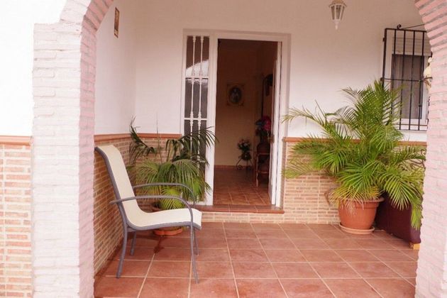 Foto 2 de Venta de casa rural en Viñuela de 3 habitaciones con piscina y jardín