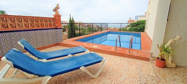 Foto 1 de Venta de chalet en Caleta de Vélez de 4 habitaciones con terraza y piscina