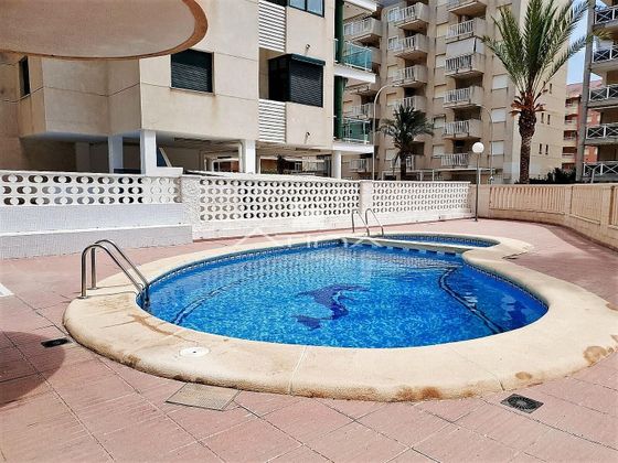 Foto 2 de Piso en venta en Daimús de 3 habitaciones con terraza y piscina