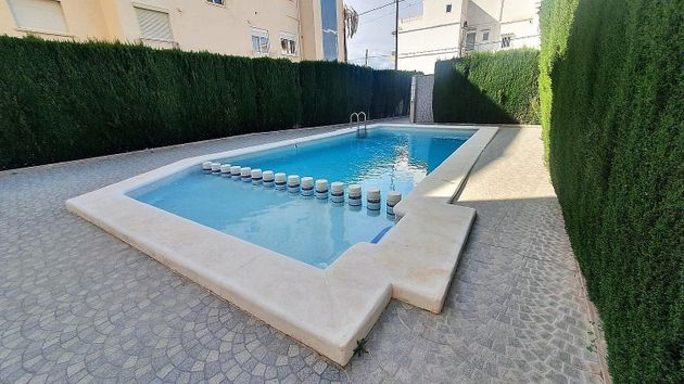 Foto 2 de Ático en venta en Daimús de 2 habitaciones con terraza y piscina