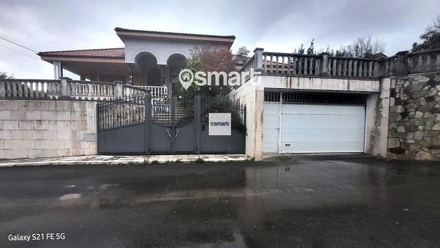 Foto 1 de Casa en venta en Alfoz de Lloredo de 7 habitaciones con terraza y piscina