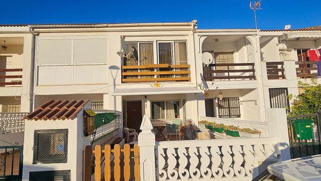 Foto 2 de Casa adossada en venda a Playa norte de 2 habitacions amb terrassa i jardí