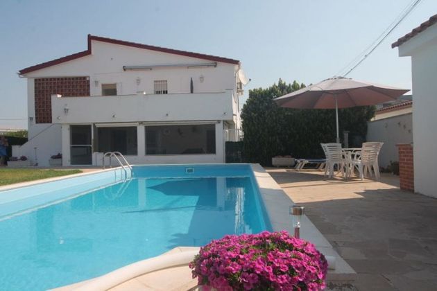 Foto 1 de Chalet en venta en Cala del Puntal  de 5 habitaciones con terraza y piscina