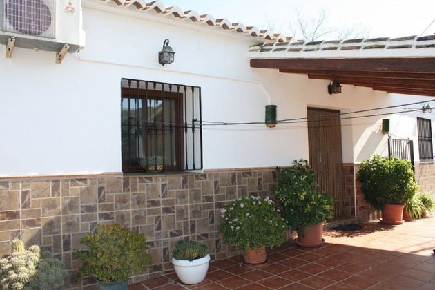 Foto 2 de Casa rural en venta en Benamargosa de 3 habitaciones con piscina y jardín