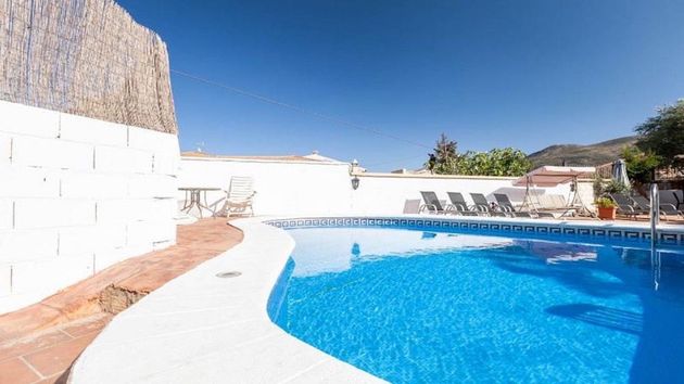 Foto 2 de Casa adossada en venda a Arenas del Rey de 7 habitacions amb terrassa i piscina