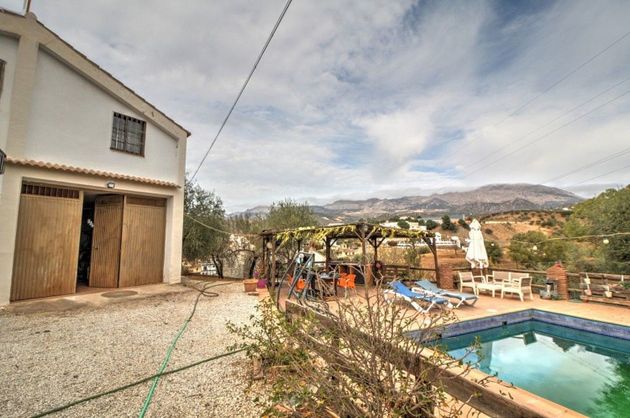 Foto 1 de Venta de casa rural en Riogordo de 7 habitaciones con terraza y piscina