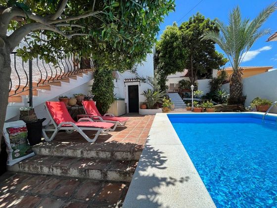 Foto 1 de Xalet en venda a Puerto de la Torre - Atabal de 5 habitacions amb terrassa i piscina