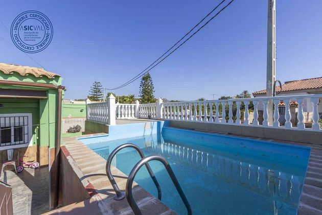 Foto 1 de Casa en venda a Náquera de 4 habitacions amb piscina i garatge