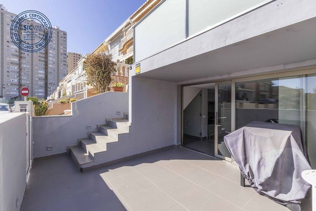 Foto 2 de Venta de casa en Playa del Puig de 3 habitaciones con terraza y piscina