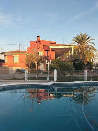 Foto 1 de Venta de chalet en urbanización Beniparrell de 5 habitaciones con terraza y piscina