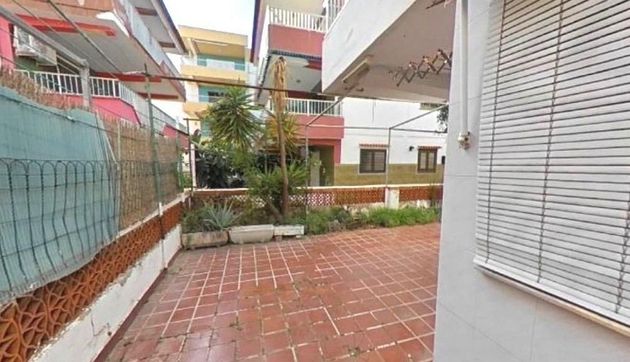 Foto 1 de Piso en venta en Oliva Playa de 3 habitaciones con terraza y jardín