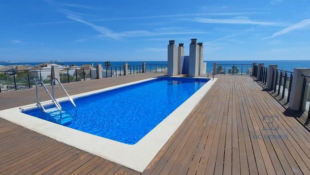 Foto 1 de Venta de piso en Playa de Puçol de 2 habitaciones con terraza y piscina