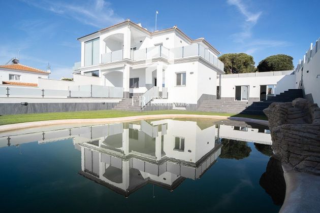 Foto 1 de Casa adosada en venta en Palos de la Frontera de 4 habitaciones con piscina y garaje