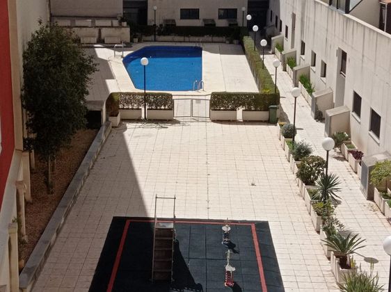 Foto 1 de Venta de piso en Alfafar de 2 habitaciones con piscina y jardín