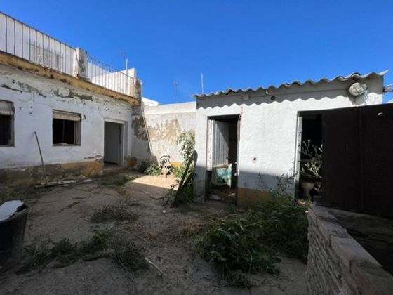 Foto 1 de Casa adossada en venda a Albaida del Aljarafe de 3 habitacions i 215 m²