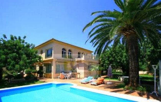 Foto 1 de Casa adosada en venta en El Higueral - La Merced de 4 habitaciones con terraza y piscina