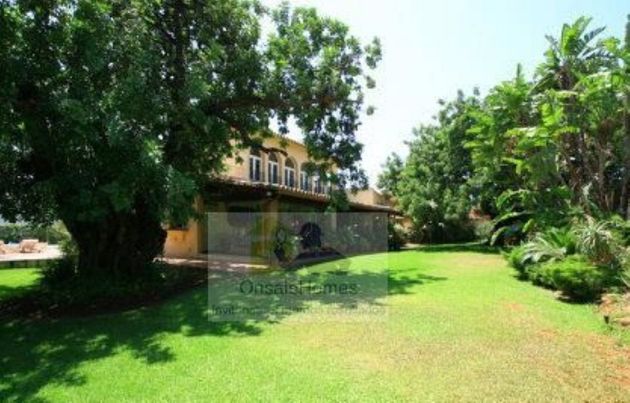 Foto 2 de Casa adosada en venta en El Higueral - La Merced de 4 habitaciones con terraza y piscina
